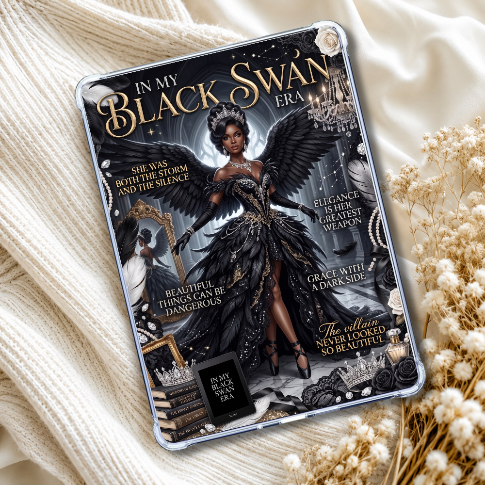 A tablet case with a gothic 'In My Black Swan Era' graphic design, styled on a cream-colored knit blanket with dried flowers.