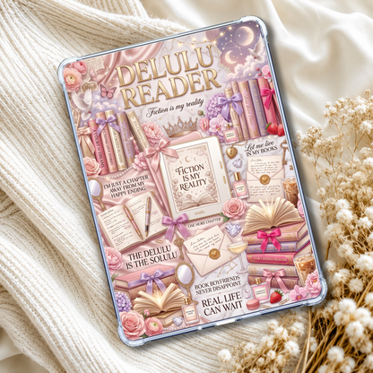 A clear iPad case with a detailed, whimsical book-themed graphic print, styled on a cream knit blanket with dried flowers.