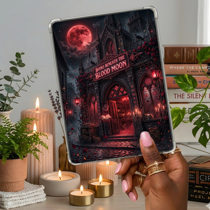 Books Beneath the Blood Moon shown on a handheld eReader