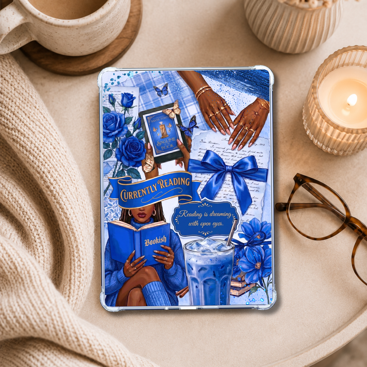 Currently Reading Blue Melanin Girl shown on an eReader in a styled setting