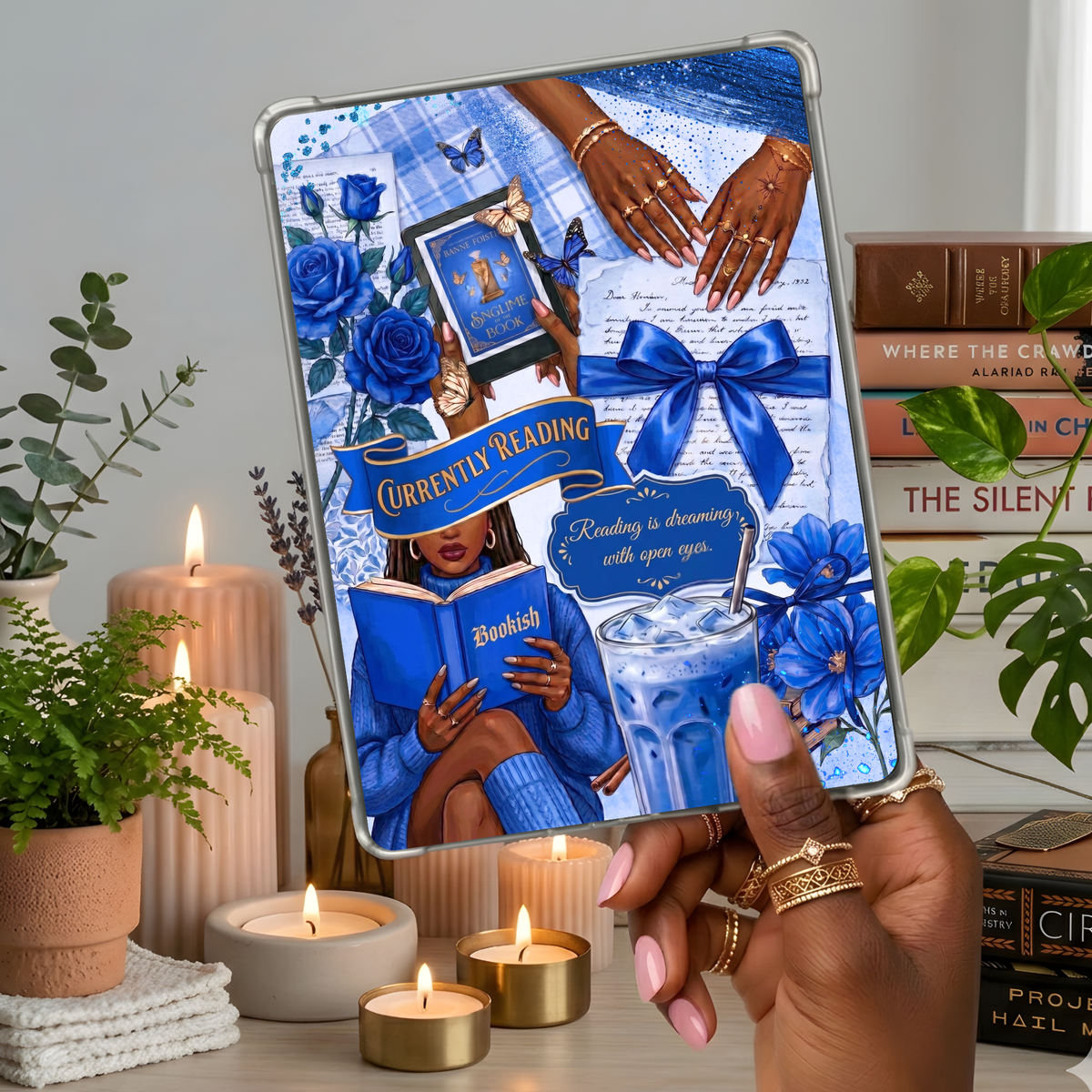 Currently Reading Blue Melanin Girl shown on a handheld eReader