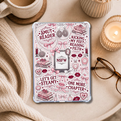 NSFW Pink Smut Reader shown on an eReader in a styled setting