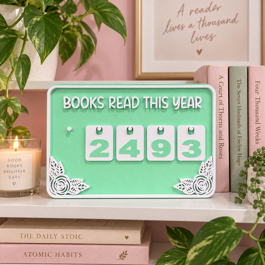Green Reader’s Tally Board displayed on a bookshelf