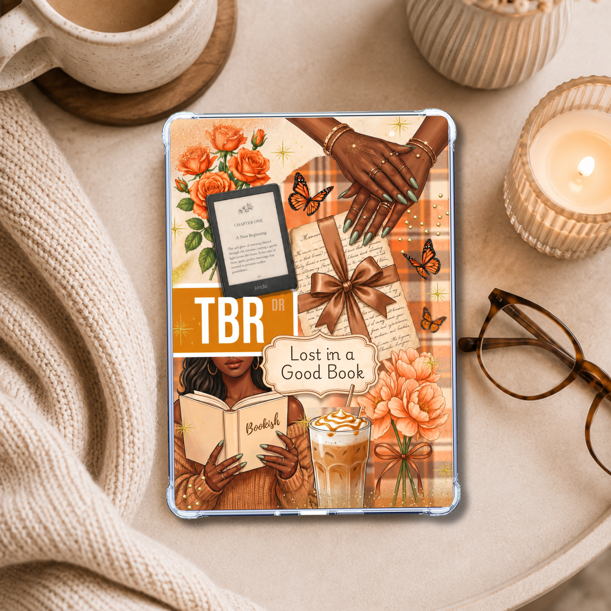 TBR Orange Melanin Girl shown on an eReader in a styled setting