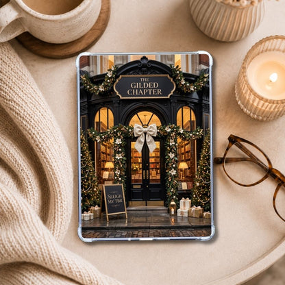 The Gilded Chapter Kindle insert styled in a clear eReader case
