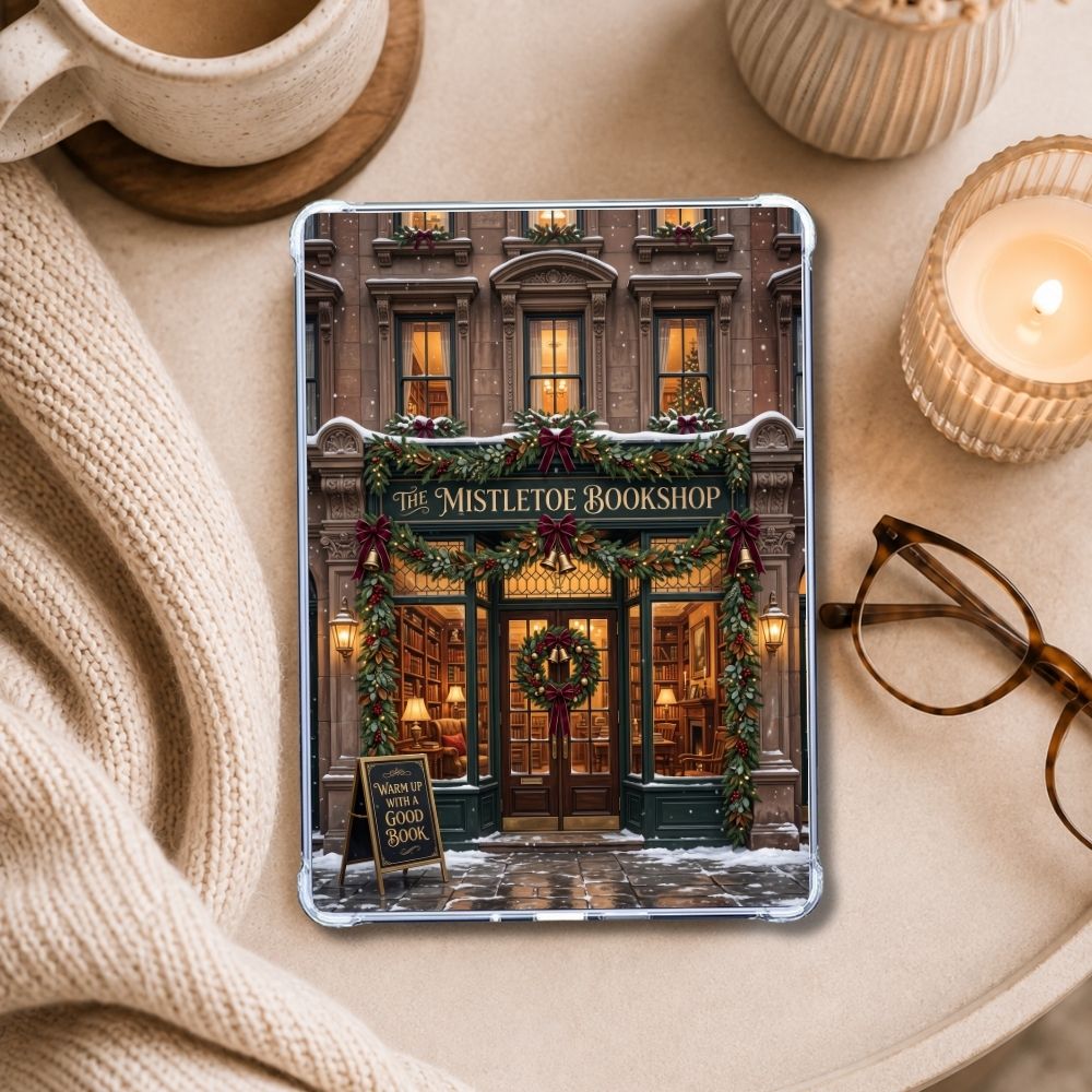 The Mistletoe Bookshop Kindle insert styled in a clear eReader case